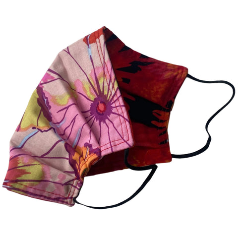 Colorful fabric face mask with a floral pattern on a white background