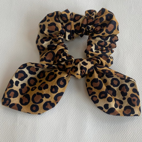 Leopard print scrunchie on a white background