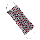 Fabric face mask with red and white strawberry pattern on a white background