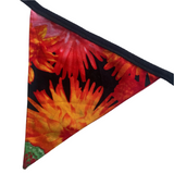 Triangle-shaped fabric flag with fiery design on a white background