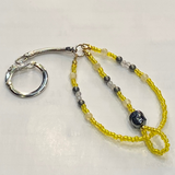 Crystal Buddha Keyring Hematite & Yellow