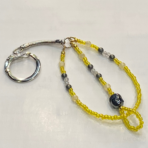 Crystal Buddha Keyring Hematite & Yellow