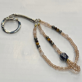 Crystal Buddha Keyring Hematite & Champagne